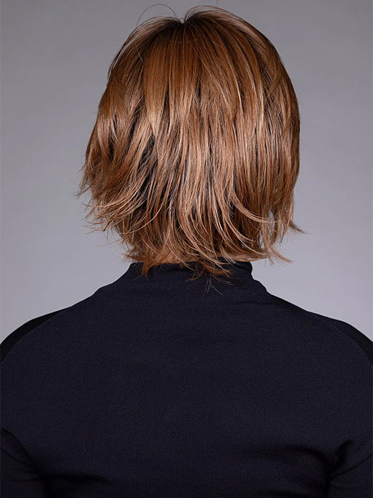 Model is wearing MIXED BERRY R | A bold, berry-inspired red with deep auburn tones and soft rooting for a natural regrowth effect.