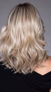 Model is wearing ANNA by BELLETRESS in color BUTTERBEER R | Dark Brown Base and Root that transitions smoothly into a buttery blonde, infused with creamy honey and toffee tones
