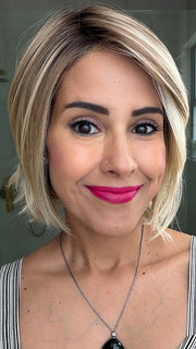Lorena @faux.hurr.lifee wearing ALICANTE by BELLE TRESS in color RAW SUGAR BLONDE | A Neutral Light Blonde, Honey Blonde, Pale Gold Blonde, with a base of Light Brown Low Lights featuring a Medium Root Color