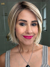 Lorena @faux.hurr.lifee wearing ALICANTE by BELLE TRESS in color RAW SUGAR BLONDE | A Neutral Light Blonde, Honey Blonde, Pale Gold Blonde, with a base of Light Brown Low Lights featuring a Medium Root Color