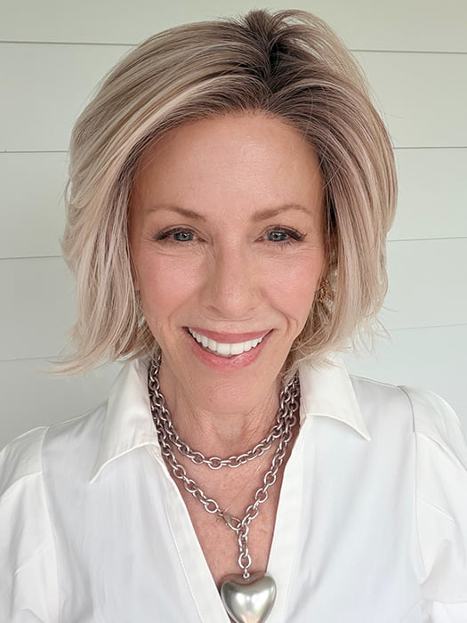 Shannon @shannonwigsout is wearing ALICANTE by BELLE TRESS in color MILKSHAKE BLONDE R | A mixture of Light Sandy Brown, Highlighted with Light Ash Blonde with a Hint of Light Platinum Blonde with a Medium Root Color
