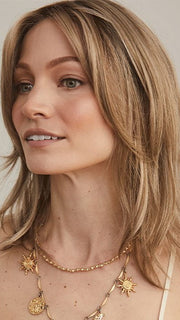 ALICIA by RENE OF PARIS in color CHAMPAGNE SUNSET | Dark/medium multi-tonal blond with textured honey, ash, and golden hues and chocolate brown roots