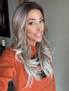 Nichole Corbett @nicholealee wearing ALLURE WAVEZ by RENE OF PARIS in color MELTED-MARSHMALLOW | Subtly Warm Dark Sandy Blonde Blend with Medium Brown Roots and Light Ash Blonde Tips and Highlights