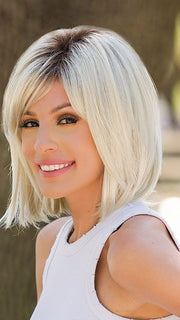 Roxie wearing ALVA by NORIKO in CHAMPAGNE-R | Light Beige Blonde, Medium Honey Blonde, and Platinum Blonde Blend with Dark Roots PPC MAIN IMAGE