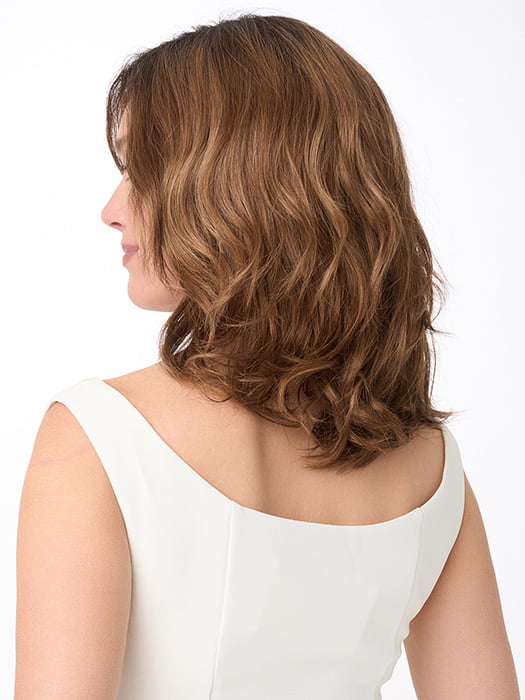 Model is wearing AMANDA by ENVY in color CINNAMON TOFFEE | Neutral to Warm Light Brown with Dark Brown Roots