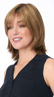 Model is wearing AMBER by ENVY in color TOASTED SESAME | Medium Brown roots with overall Warm Cinnamon base and Wheat Blonde highlights