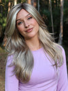 Heather @cjswigs wearing ANGELICA PM by NORIKO in color ARABIAN SAND | Neutral Chocolate Brown Roots fade into a Neutral Blonde Base, blended with Sandy, Chestnut, Golden, and Honey Blondes, with Soft Creamy Blonde Highlights and Face-Framing Lowlights