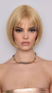 Model is wearing ARIA by RENE OF PARIS in color CREAMY | Light Platinum Blonde and Light Honey Blonde evenly blended