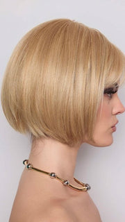 Model is wearing ARIA by RENE OF PARIS in color CREAMY TOFFEE | Light Platinum Blonde and Light Honey Blonde evenly blended