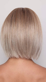 Model is wearing ARIA by RENE OF PARIS in color MUSHROOM MELANGE | A modern mushroom blonde with a mid-brown root, featuring tones of cream, pale chocolate, and soft steel blonde. 