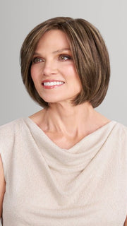 Model is wearing AVA in 8RH14 MOUSSE CAKE | Medium Brown with 33% Medium Natural Blonde Highlights