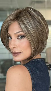 Model is wearing AVA by JON RENAU in color 10RH16 CAFFE MOCHA | Light Brown with 33% Light Natural Blonde Highlights
