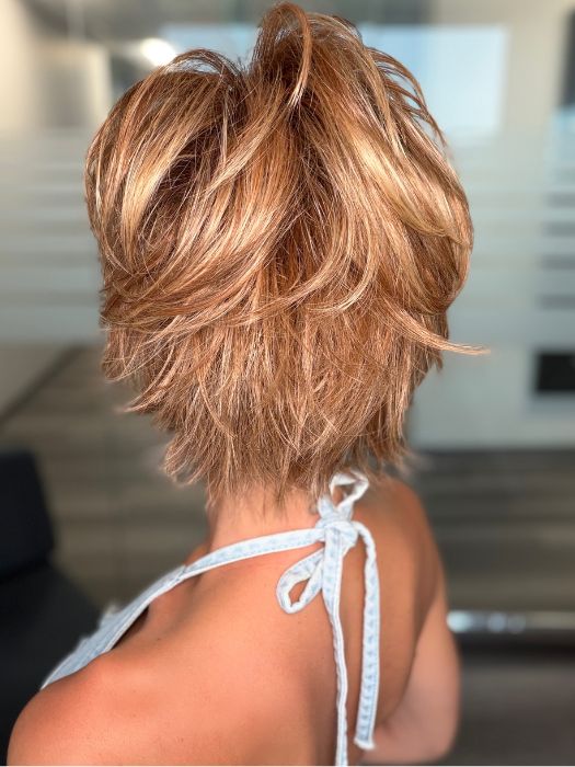 Roxie is wearing AVENUE SOFT by ELLEN WILLE in LIGHT BERNSTEIN ROOTED 12.26.27 | Lightest Brown, Light Golden Blonde, and Dark Strawberry Blonde Blend with Shaded Roots