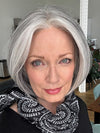 Mel B. @mels.be.ageless wearing AYUMI by RENE OF PARIS in color SILVER STONE | Silver Medium Brown blend that transitions to more Silver then Medium Brown then to Silver Bangs