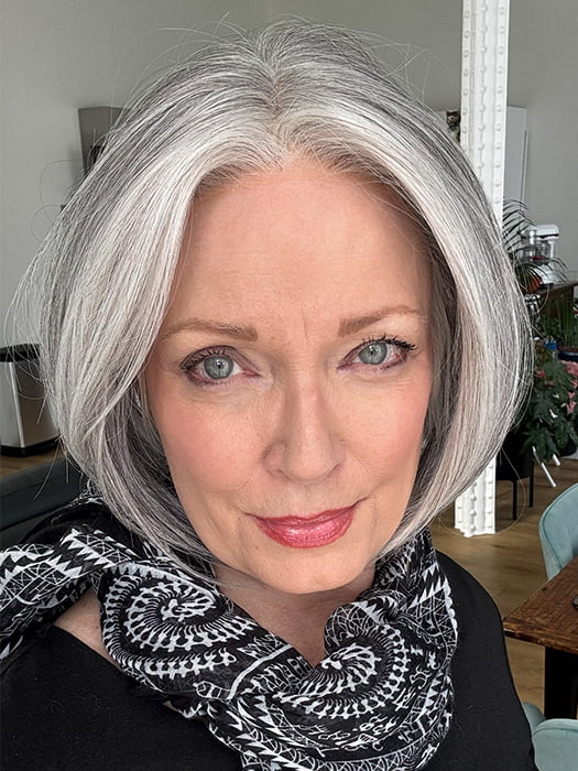 Mel B. @mels.be.ageless wearing AYUMI by RENE OF PARIS in color SILVER STONE | Silver Medium Brown blend that transitions to more Silver then Medium Brown then to Silver Bangs
