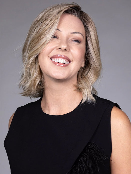 Model is wearing BUTTERCAKE BLONDE-R | A neutral-warm blonde blend featuring light brown, ash, and lightest blonde tones with natural-looking darker roots for added depth and realism.