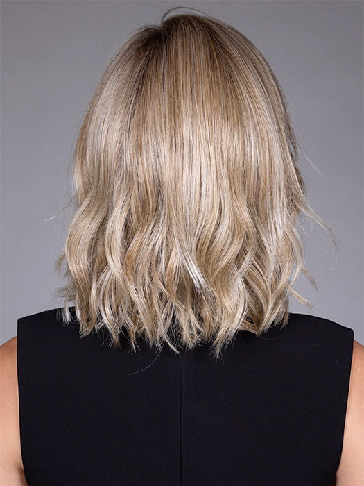 Model is wearing BUTTERCAKE BLONDE-R | A neutral-warm blonde blend featuring light brown, ash, and lightest blonde tones with natural-looking darker roots for added depth and realism.
