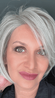 Emily H. @she_sheds_more wearing IGNITE by JON RENAU in color 56F51 OYSTER | Light Grey with 20% Medium Brown Front, graduating to Grey with 30% Medium Brown Nape