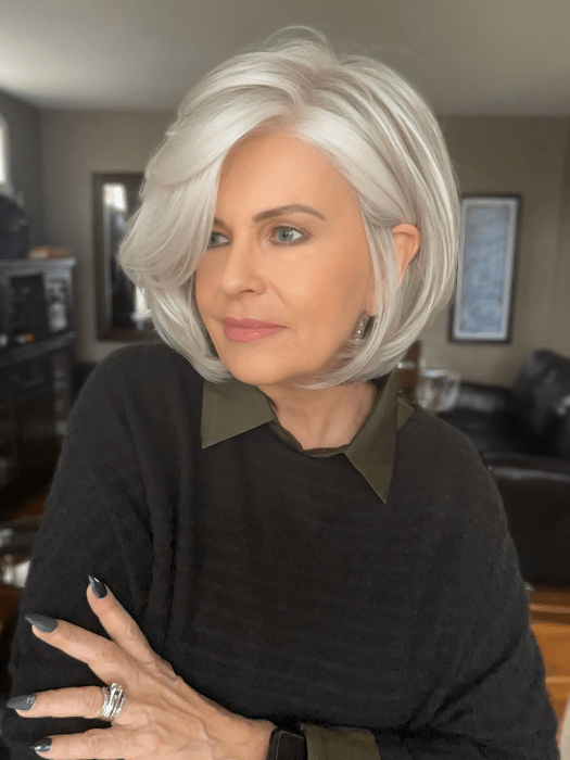 Donna @style.me.ageless wearing IN CHARGE by RAQUEL WELCH WIGS in color RL51/61 ICED GRANITA | Lightest Grey Progresses to a Deep Grey at the Nape