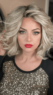 Sandy @i_be_wiggin wearing EDITORS PICK ELITE by RAQUEL WELCH WIGS in color RL19/23SS SHADED BISCUIT | Light Ash Blonde Evenly Blended with Cool Platinum Blonde with Dark Roots