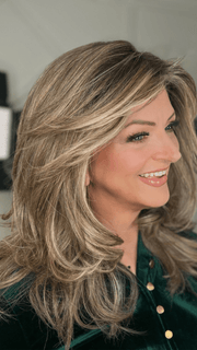 Sandy Holston @i_be_wiggin wearing CURVE APPEAL by RAQUEL WELCH WIGS in color RL12/22SS SHADED CAPPUCCINO | Light Golden Brown Evenly Blended with Cool Platinum Blonde Highlights and Dark Roots