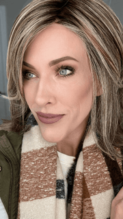 Kristyna Moore @kristynamoore wearing BIG TIME by RAQUEL WELCH WIGS in color RL12/22SS SHADED CAPPUCCINO | Light Golden Brown Evenly Blended with Cool Platinum Blonde Highlights with Dark Roots