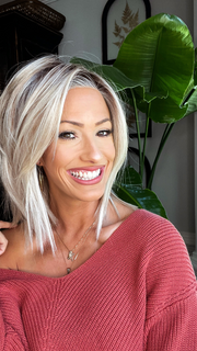 Jenna Fail @jenna_fail wearing BIG TIME by RAQUEL WELCH WIGS in color RL19/23SS SHADED BISCUIT | Light Ash Blonde Evenly Blended with Cool Platinum Blonde with Dark Roots which has been straightened at the ends