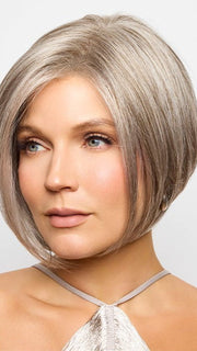 This short wig is crafted with sleek synthetic hair for a ready-to-wear hairstyle