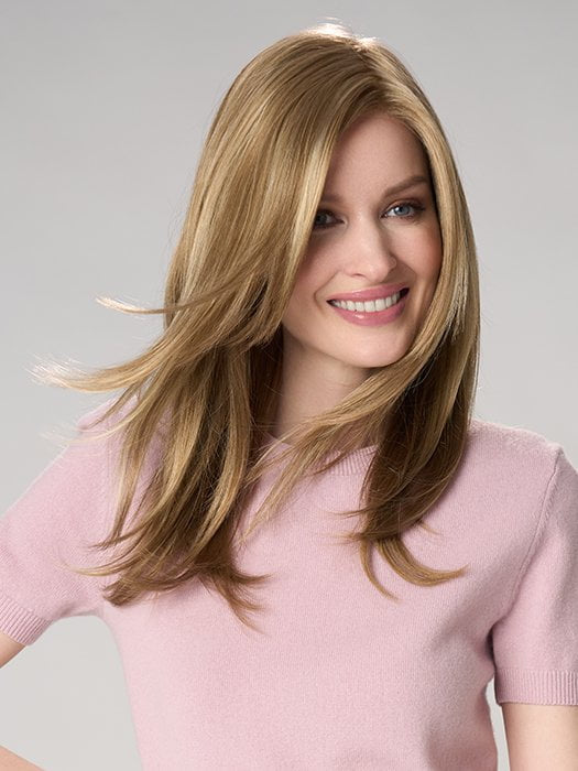 Model is wearing BELINDA HAND TIED by ENVY in color DARK BLONDE | 2 toned blend of Dark Honey Blonde with Lighter Blonde highlights