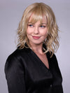 Model is wearing BIRMINGHAM in color BUTTER CREAM BLONDE | Golden Blonde with light blonde highlights