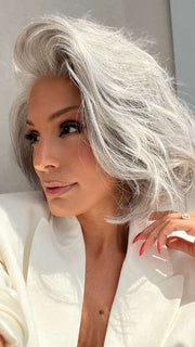 Model is wearing SAGE by ESTETICA in color R51LF60 | Off Black with 75% Grey Lightening to Gold Blonde Mix in Front