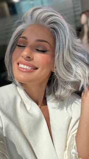 Model is wearing SAGE by ESTETICA in color R51LF60 | Off Black with 75% Grey Lightening to Gold Blonde Mix in Front