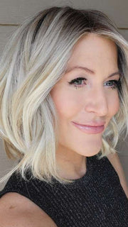 Natalie Gray @vanish.into.thin.hair wearing wearing Mira by Amore in shade SEA SALT BLOND R | A perfect mixture of cool, icy-blond and warm-dark blond. The rich brown root tone enhances the modern appearance.