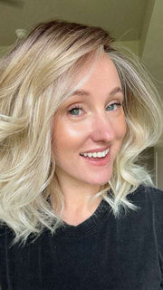Carlyn @carlynwilson84 wearing ROHAN by AMORE in color MELTED SAND | MELTED SAND | Rich, warm brown root melts into the neutral blond tone. Light-beige blond ends complete this stunning color.