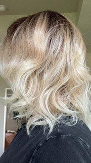 Carlyn @carlynwilson84 wearing ROHAN by AMORE in color MELTED SAND | MELTED SAND | Rich, warm brown root melts into the neutral blond tone. Light-beige blond ends complete this stunning color.