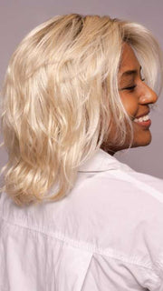 Model is wearing MELLOW by ESTETICA in shade SPF BLONDE | Golden Blonde, Pale Blonde, Iced Blonde Blended with Soft Brown Roots