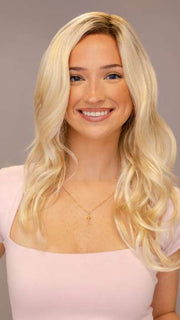 Model is wearing BLAZE by ESTETICA in shade SPF BLONDE | Golden Blonde, Pale Blonde, Iced Blonde Blended with Soft Brown Roots