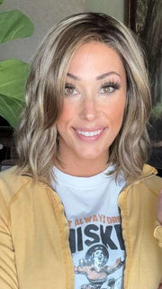 Nichole @nichole.alee wearing CHARLOTTE by ENVY BY ALAN EATON in shade HONEY BREEZE | A blend of Cool, Honey Blonde and Multi-Dimensional Medium Brown with Darker Brown Roots