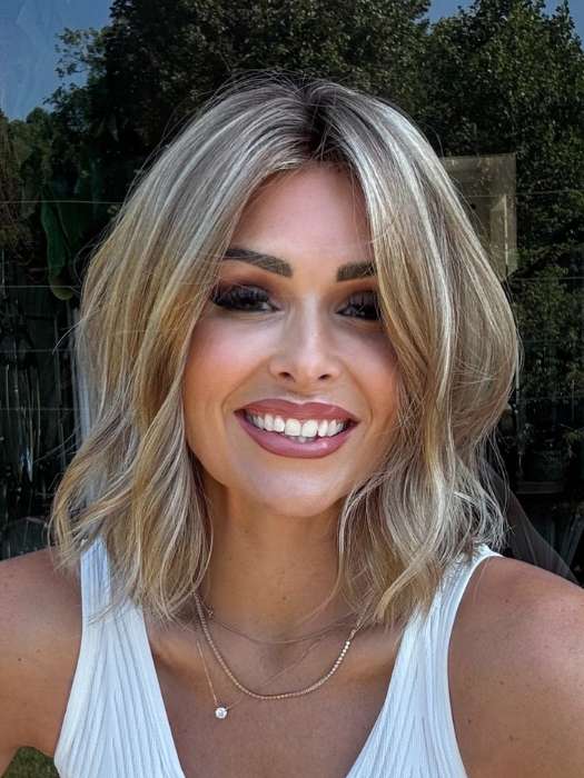 Crystal @crystallhoneycutt is wearing CHARLOTTE by ENVY  in SAHARA BLONDE | Softer Dark Blonde with Light Golden Blonde, and features Chestnut Roots