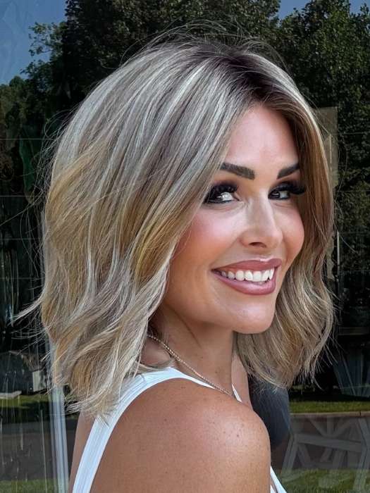 Crystal @crystallhoneycutt is wearing CHARLOTTE by ENVY  in SAHARA BLONDE | Softer Dark Blonde with Light Golden Blonde, and features Chestnut Roots