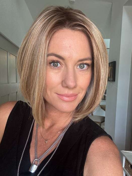 Jenny B. @thewiggygirl wearing EURO CHIC by TRESSALLURE in color 14/26/R10 | Red Blonde with Gold Blonde highlights and Light Brown roots