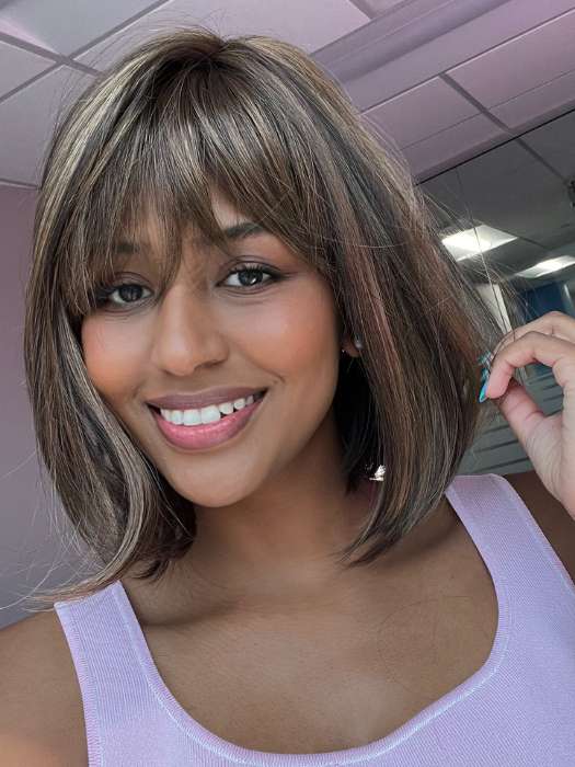 Model is wearing PAIGE PETITE by ENVY in color MEDIUM BROWN | Medium Brown with natural highlights