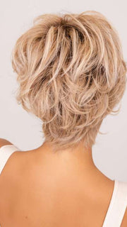 Model is wearing CURATED CUT by RAQUEL WELCH in color SS19/23 SHADED BISCUIT | Light Ash Blonde Evenly Blended with Cool Platinum Blonde with Dark Roots