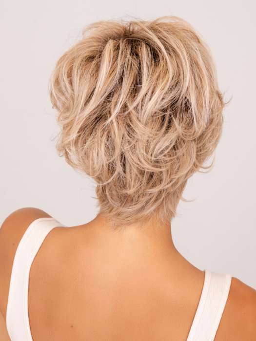 Model is wearing CURATED CUT by RAQUEL WELCH in color SS19/23 SHADED BISCUIT | Light Ash Blonde Evenly Blended with Cool Platinum Blonde with Dark Roots