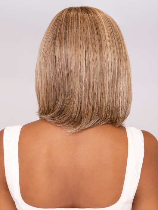 Model is wearing ALWAYS TRENDING by RAQUEL WELCH in color SS12/22 SHADED CAPPUCCINO | Light Golden Brown Evenly Blended with Cool Platinum Blonde Highlights with Dark Roots