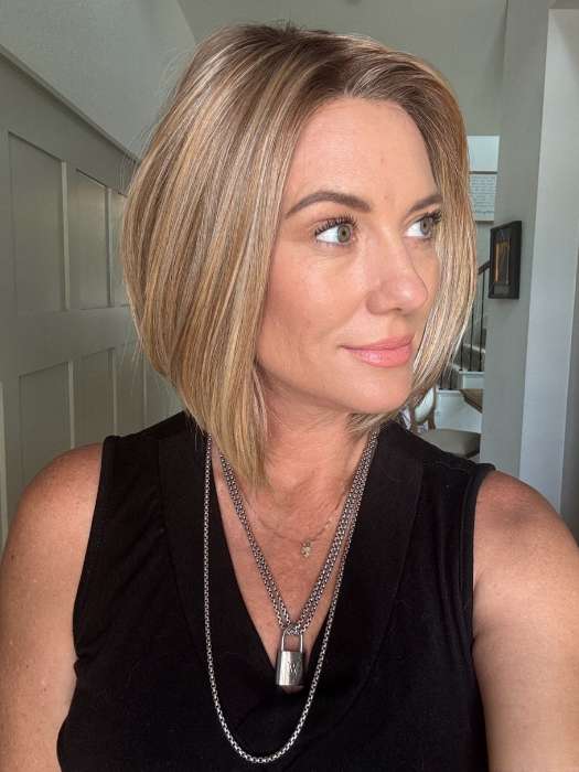 Jenny B. @thewiggygirl wearing EURO CHIC by TRESSALLURE in color 14/26/R10 | Red Blonde with Gold Blonde highlights and Light Brown roots