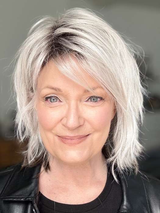 Mel B. @mels.be.ageless wearing JONES by ESTETICA in color ICY-SHADOW | Iced Blonde dusted with Soft Sand and Golden Brown Underneath