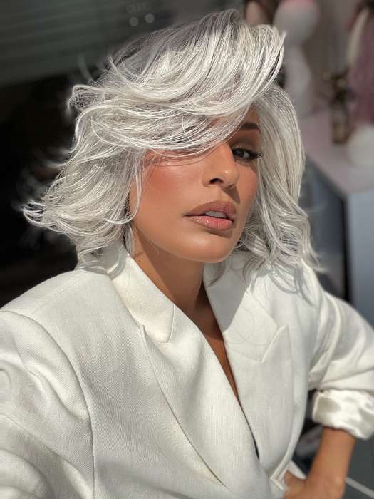 Model is wearing FLIRT ALERT by RAQUEL WELCH in color RL56/60 SILVER MIST | Lightest Gray Evenly Blended with Pure White