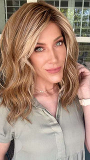 Kristyna Moore @kristynamoore wearing BEACH WAVE MAGIC by TRESSALLURE in color EL12/22/8 | Light Golden Brown Evenly Blended with Face Framing Platinum Blonde Highlights with Medium Brown Roots