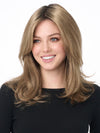 Model is wearing BOBBI by ENVY in color GOLDEN SANDSTONE | Creamy Beige-Blonde with Darker Brown Roots